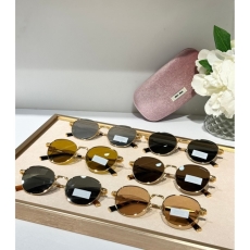 Miu miu Sunglasses